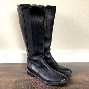 Tory Burch knee high boots.
